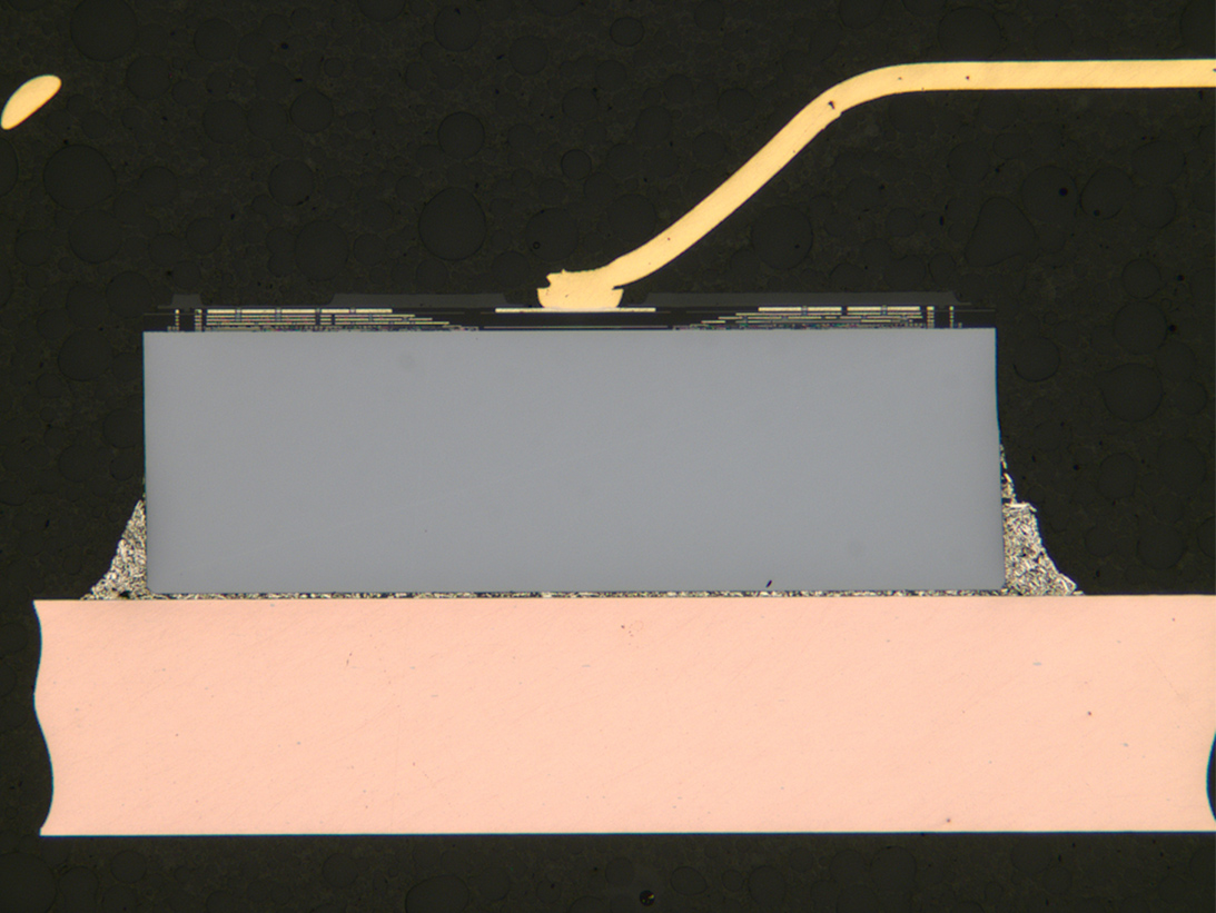 Cross-sectional view of Si die and silver epoxy fillets with gold bond wire